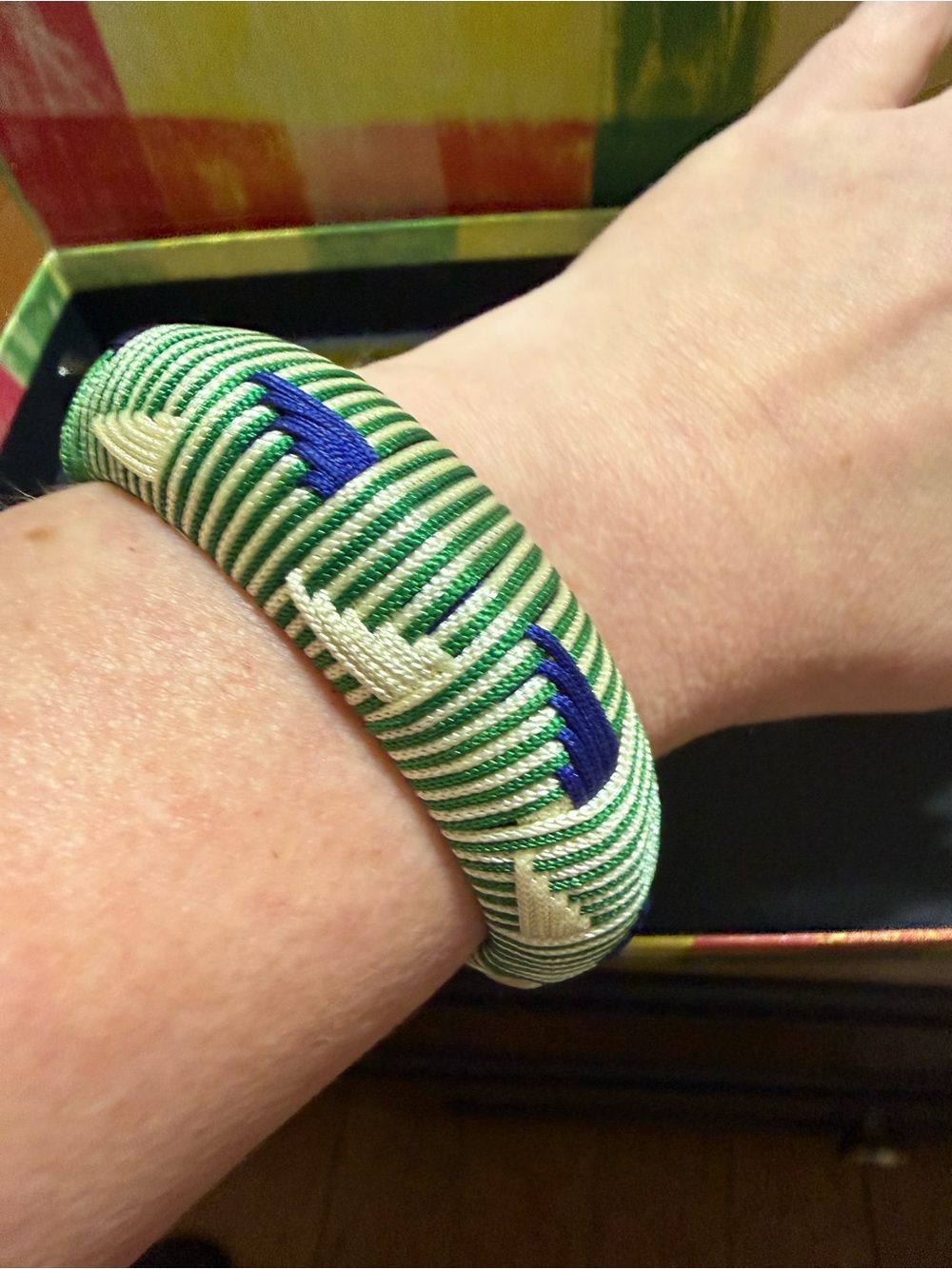Green and White Embroidered Bangle Bracelet with Blue Accents